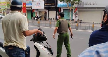 Nghi án thanh niên cầm súng, lựu đạn cướp ngân hàng Đông Á ở Sài Gòn